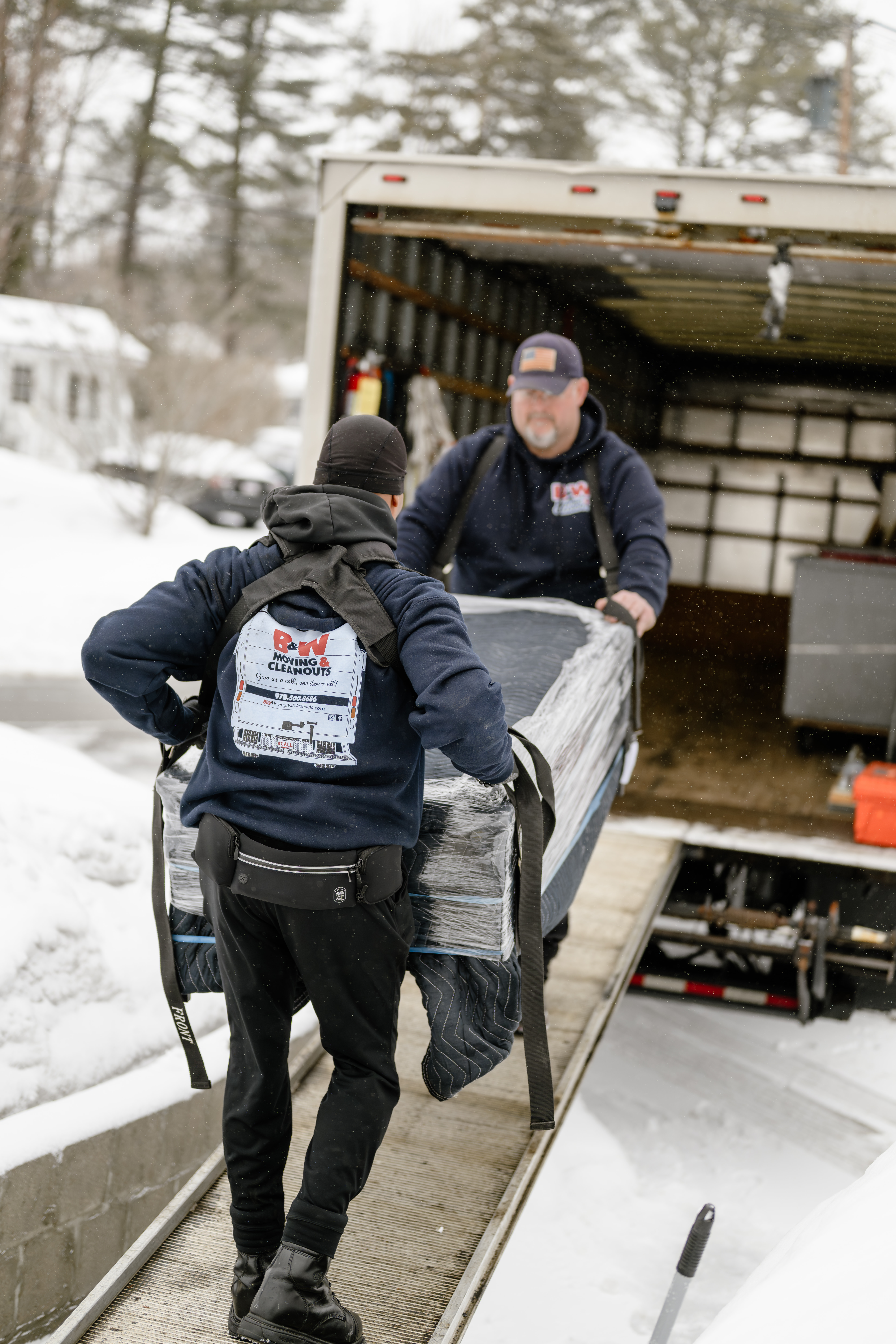 Loading Wrapped Furniture Up Truck Ramp
